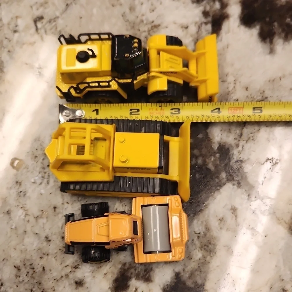 3 construction cars 2 Tonka and 1 road construction